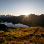 Sunrays over the lake Stor Kongsvatnet as seen from the top of Tjeldbergtinden.