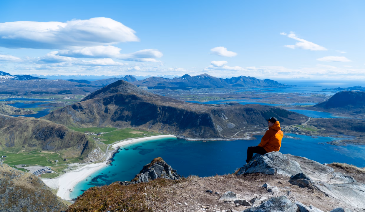 Hiker Enjoying the View Over Haukland and Vik Beaches from Veggen in Lofoten