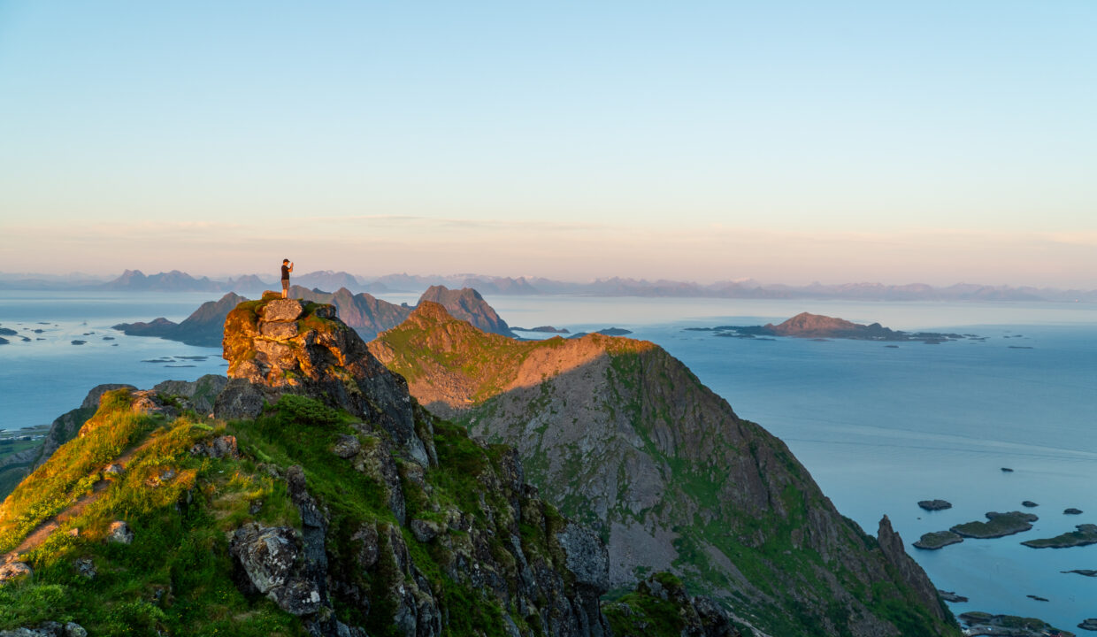 Golden Hour on Blåtinden – Panoramic View of Lofoten Mountains and Islands